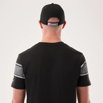 The model is wearing this NFL Sideline 2026 Las Vegas Raiders T-Shirt in black. 5
