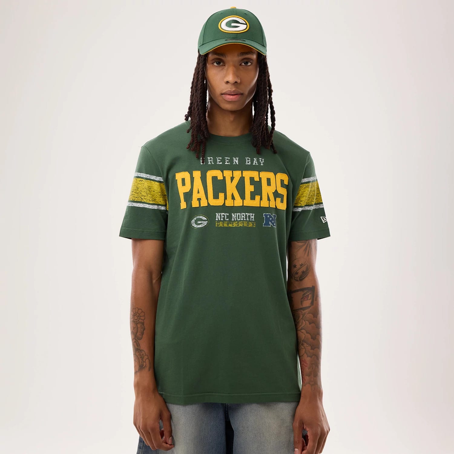 The model is wearing this NFL Sideline 2026 Green Bay Packers T-Shirt in dark green. 1