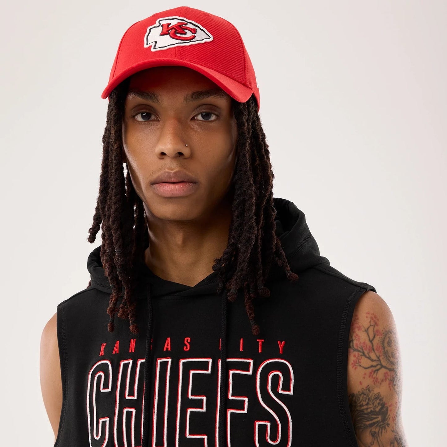 The model is wearing this NFL Sideline 2026 Kansas City Chiefs Tank Top in black. 6