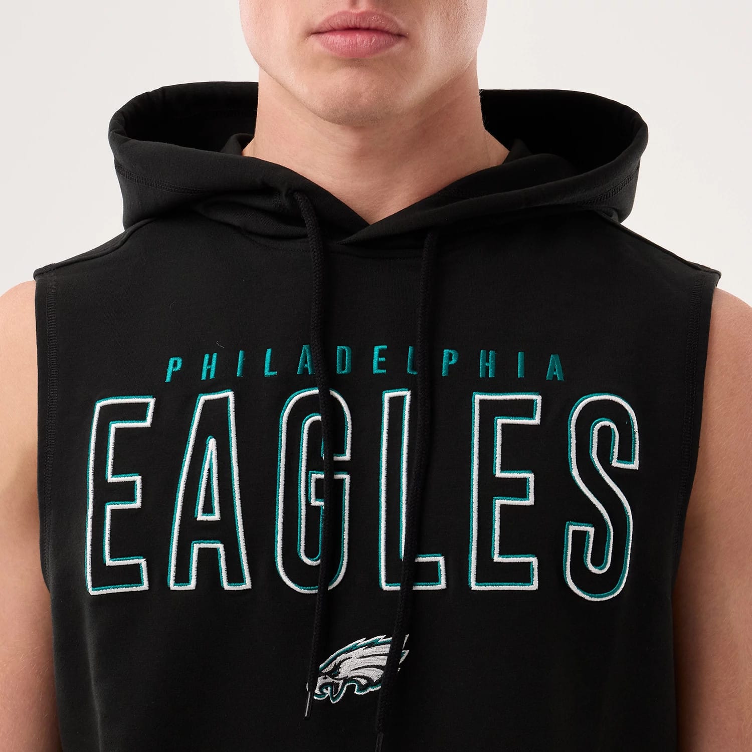 The model is wearing this NFL Sideline 2026 Philadelphia Eagles Tank Top in black. 3