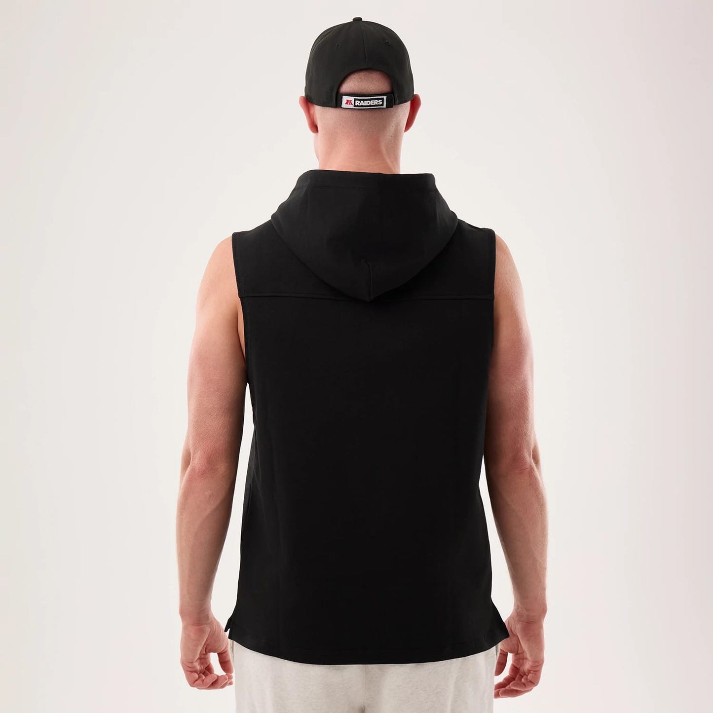 The model is wearing this NFL Sideline 2026 Las Vegas Raiders Tank Top in black. 2