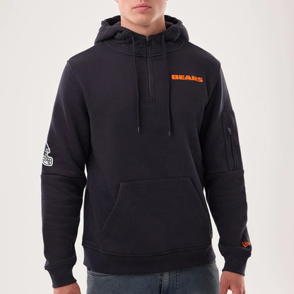 The model is wearing this NFL Sideline 2026 Chicago Bears Pullover Hoodie in navy. 5