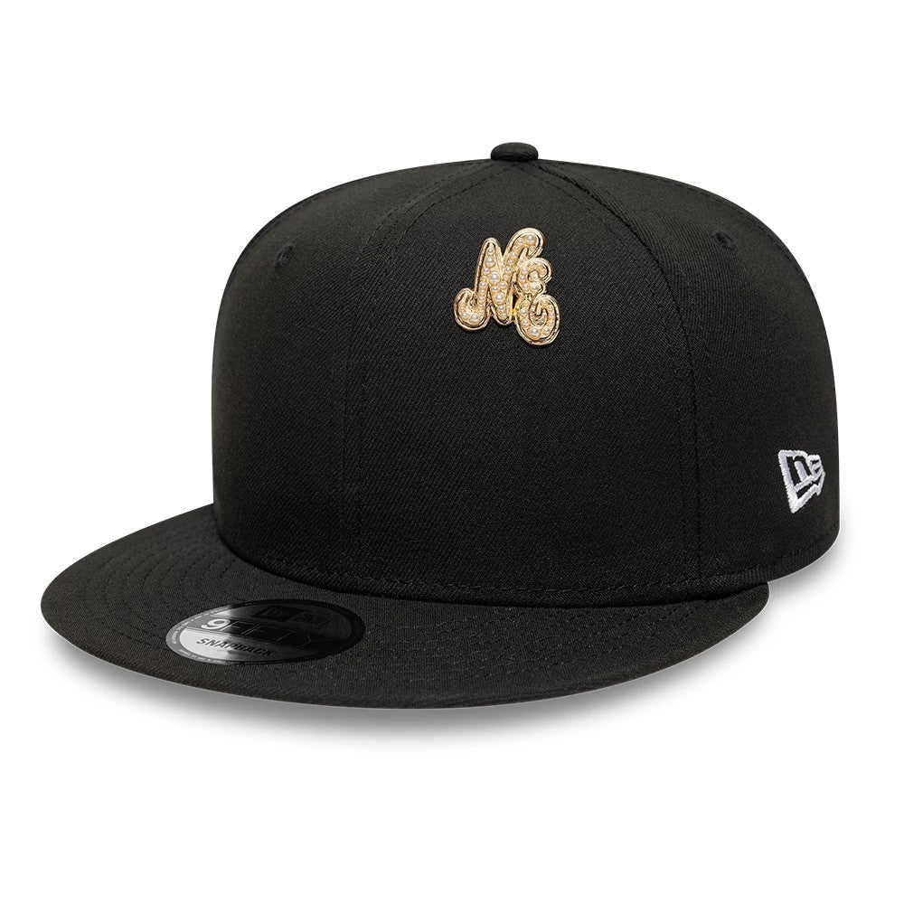Pictured is this New Era Faux Pearl Pin Badge in gold. 2
