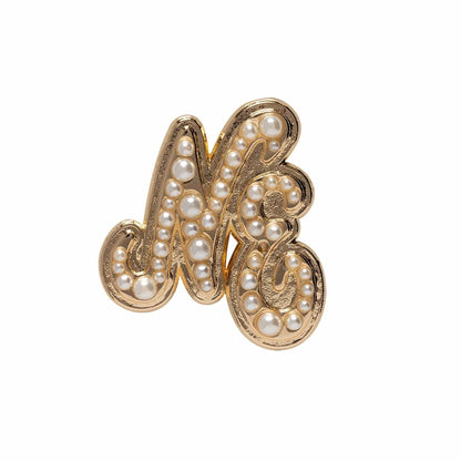 Pictured is this New Era Faux Pearl Pin Badge in gold. 1