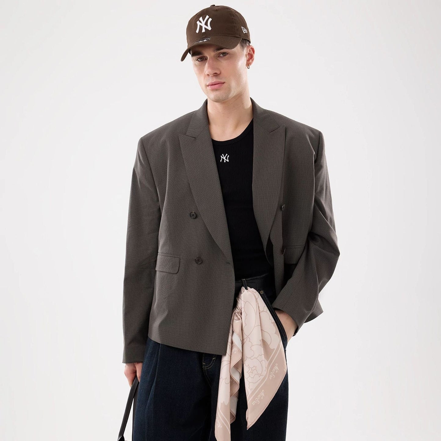 Pictured is this New Era Floral Bandana in Beige. 2