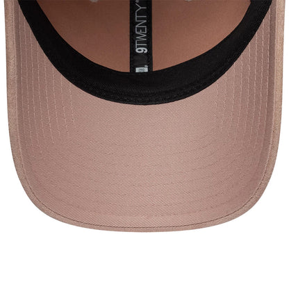 Womens New Era Textured Dusty Pink 9TWENTY Adjustable Cap, inside view showing the dusty pink undervisor with black sweatband, detailed 9TWENTY taping along the panel seams and stitching on the structured visor edge.