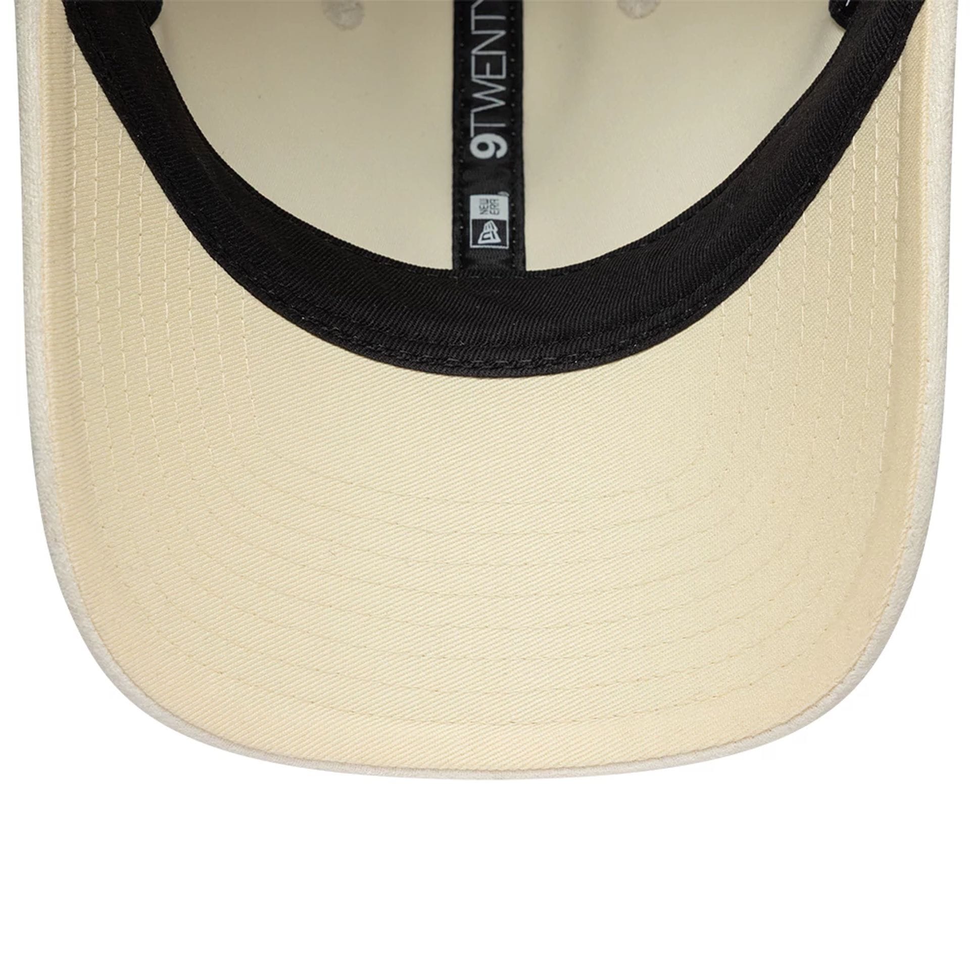 Pictured is this Womens New Era Textured 9TWENTY cap in cream. 7