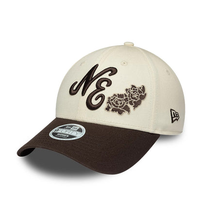 Pictured is this Womens New Era Floral 9FORTY cap in light beige. 1