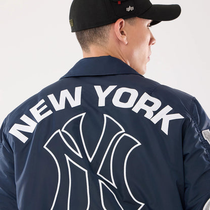 The model is wearing this MLB X Alpha New York Yankees Jacket in navy. 7