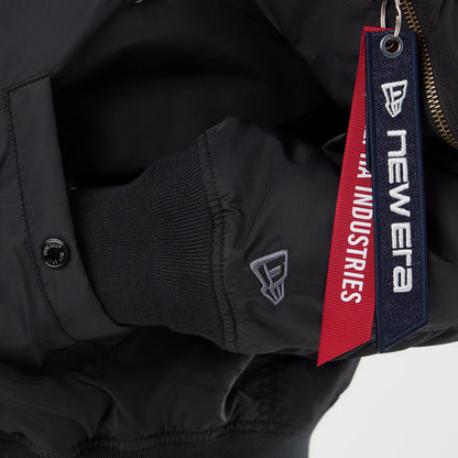 The model is wearing this NBA X Alpha Chicago Bulls Bomber Jacket & Tactical Vest in black. 5