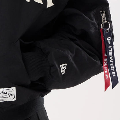 The model is wearing this MLB X Alpha New York Yankees Jacket in black. 4
