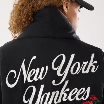 The model is wearing this MLB X Alpha New York Yankees Jacket in black. 5