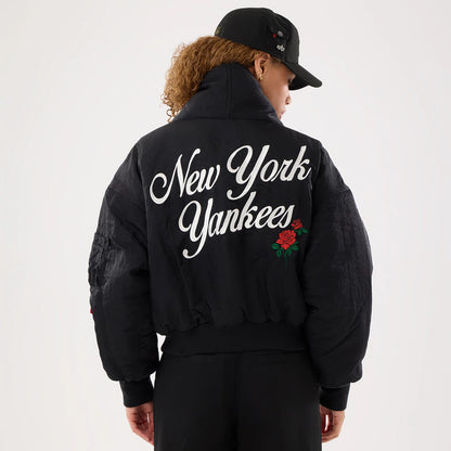 The model is wearing this MLB X Alpha New York Yankees Jacket in black. 2