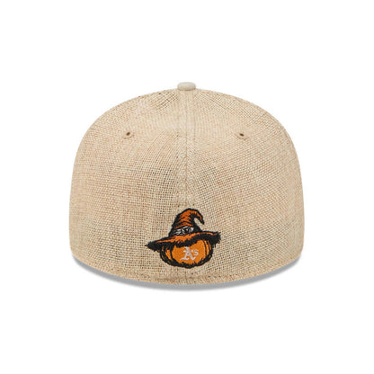 Pictured is this MLB Halloween Athletics 59FIFTY Fitted cap in beige. 5