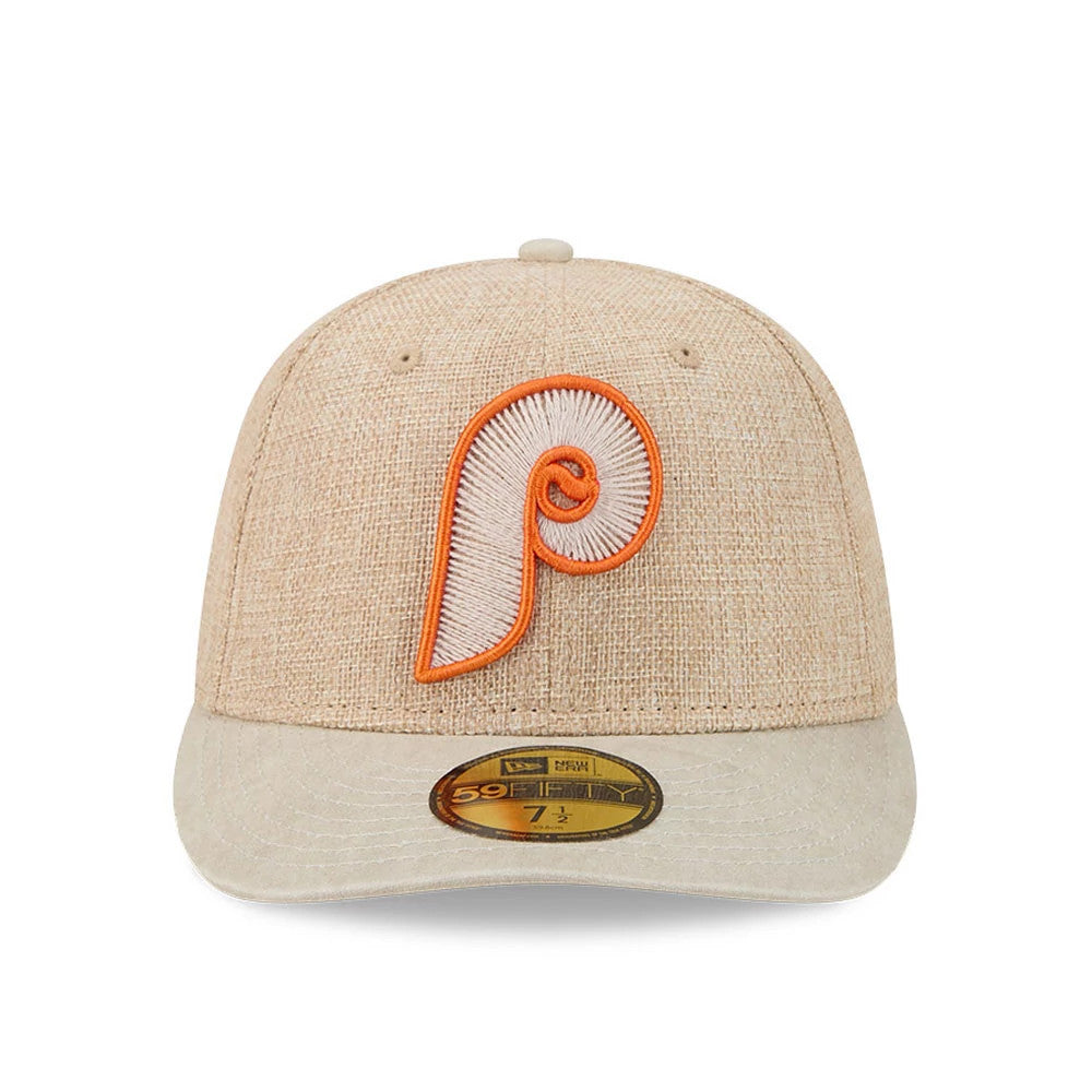 Philadelphia Phillies MLB Halloween Beige New Era 59FIFTY Fitted Cap, front view showing the orange and white embroidered logo on the structured beige crown, with a matching beige visor and gold 59FIFTY size sticker on the visor.