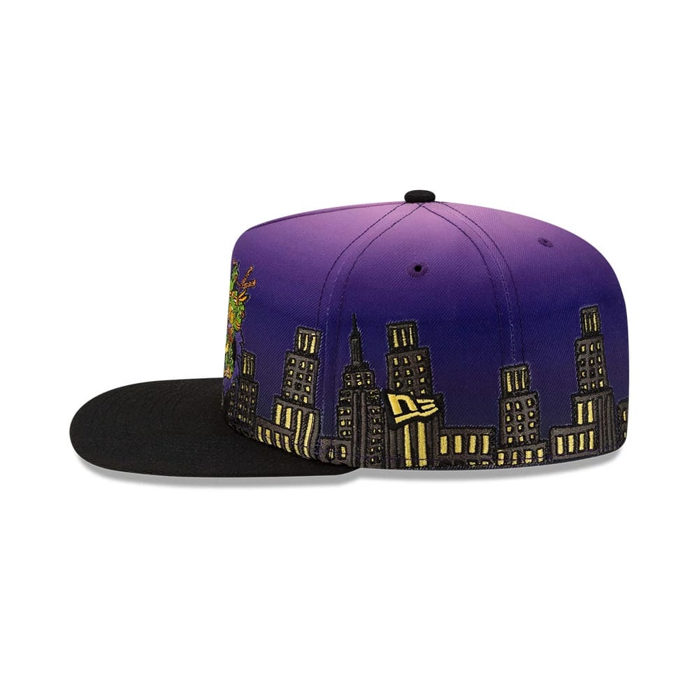 Pictured is this Teenage Mutant Ninja Turtles Skyline 59FIFTY A-Frame Fitted cap in Purple. 6
