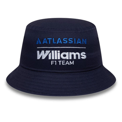 Pictured is this Youth Atlassian Williams F1 Team Essential Bucket hat in navy. 2