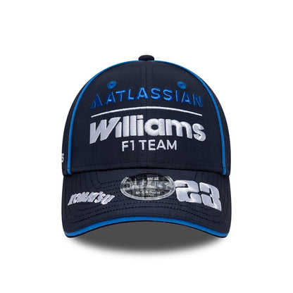 Youth Williams Alex Albon Navy New Era 9FORTY M-Crown Adjustable Cap, front view showing raised white and blue embroidered Williams F1 Team and Atlassian logos on the navy crown, with a 9FORTY size sticker on the navy visor.