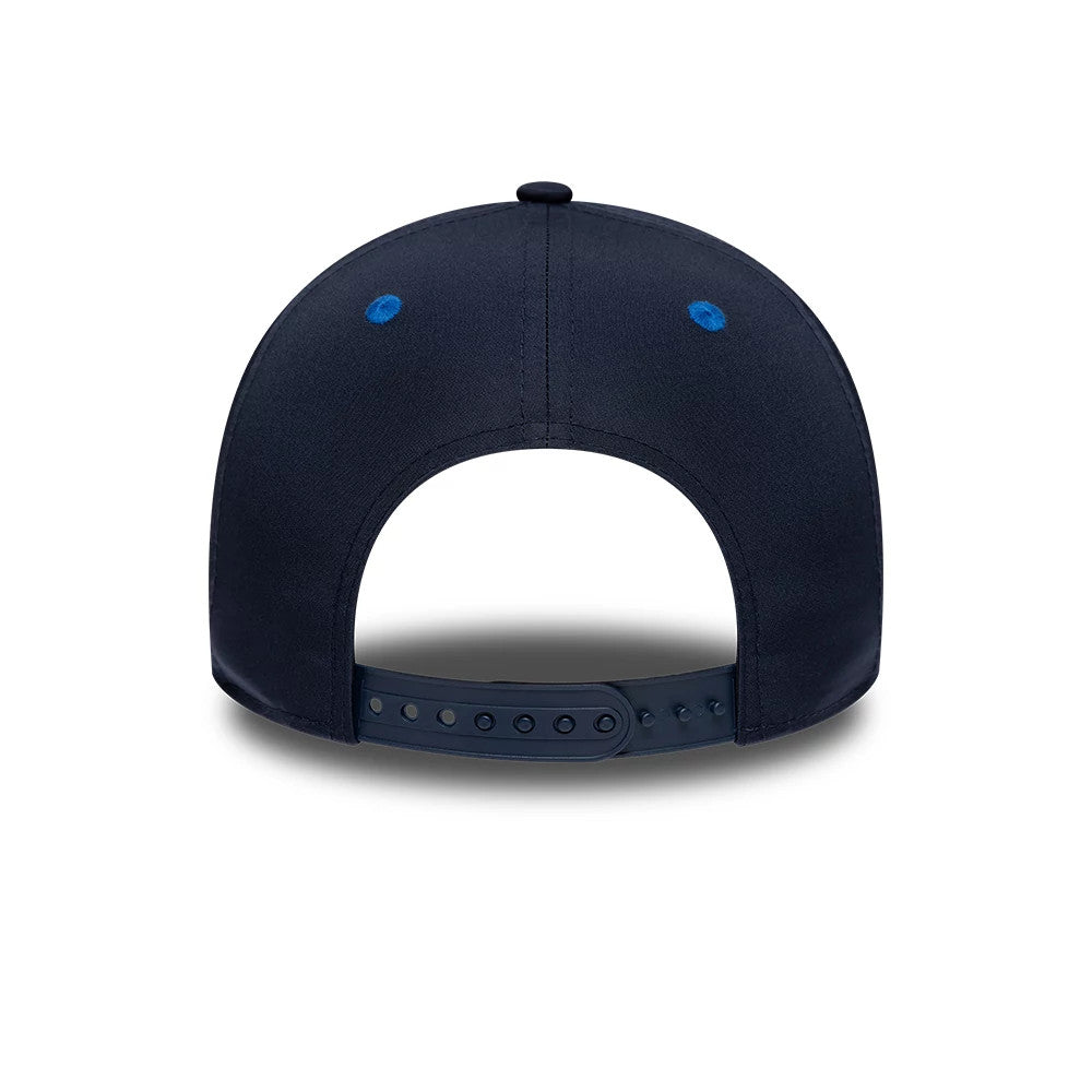 Youth Williams Alex Albon Navy New Era 9FORTY M-Crown Adjustable Cap, rear view showing a navy adjustable strap with eyelets for custom sizing, two blue embroidered eyelets, and a top button on the structured navy crown.