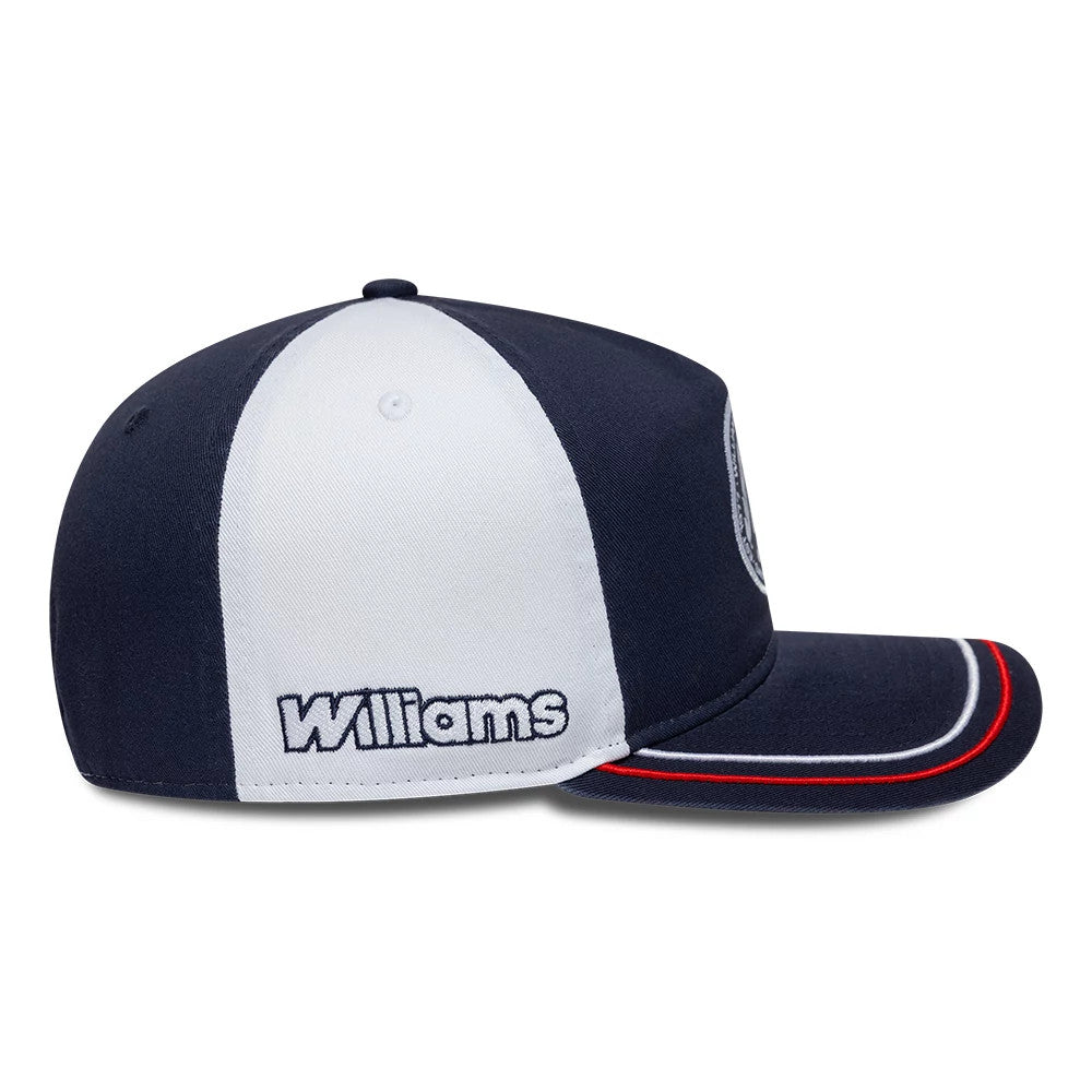 Williams Suzuka Race Special Navy New Era 19TWENTY Adjustable Cap, side view showing the Williams logo embroidered in white on the white side panel, with a navy blue visor featuring white and red trim, and a navy structured crown.