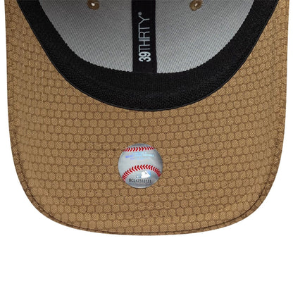 Pictured is this MLB Tech LA Dodgers 39THIRTY Stretch Fit cap in Beige. 7