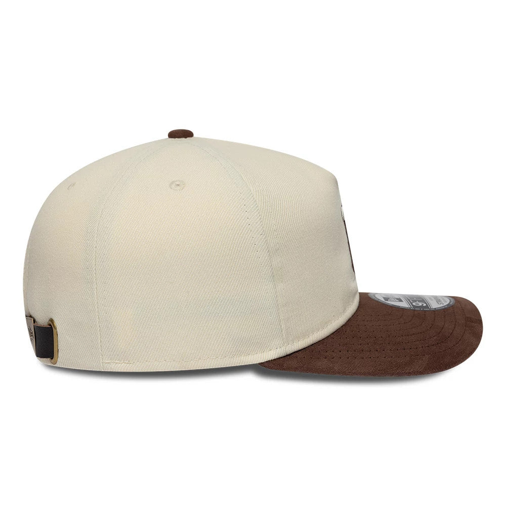 LA Angels MLB Suede Visor Cream New Era 9FIFTY A-Frame Adjustable Cap, side view showing a brown suede curved visor with a 9FIFTY size sticker, a cream structured crown, and a brown top button with a black adjustable strap at the back.