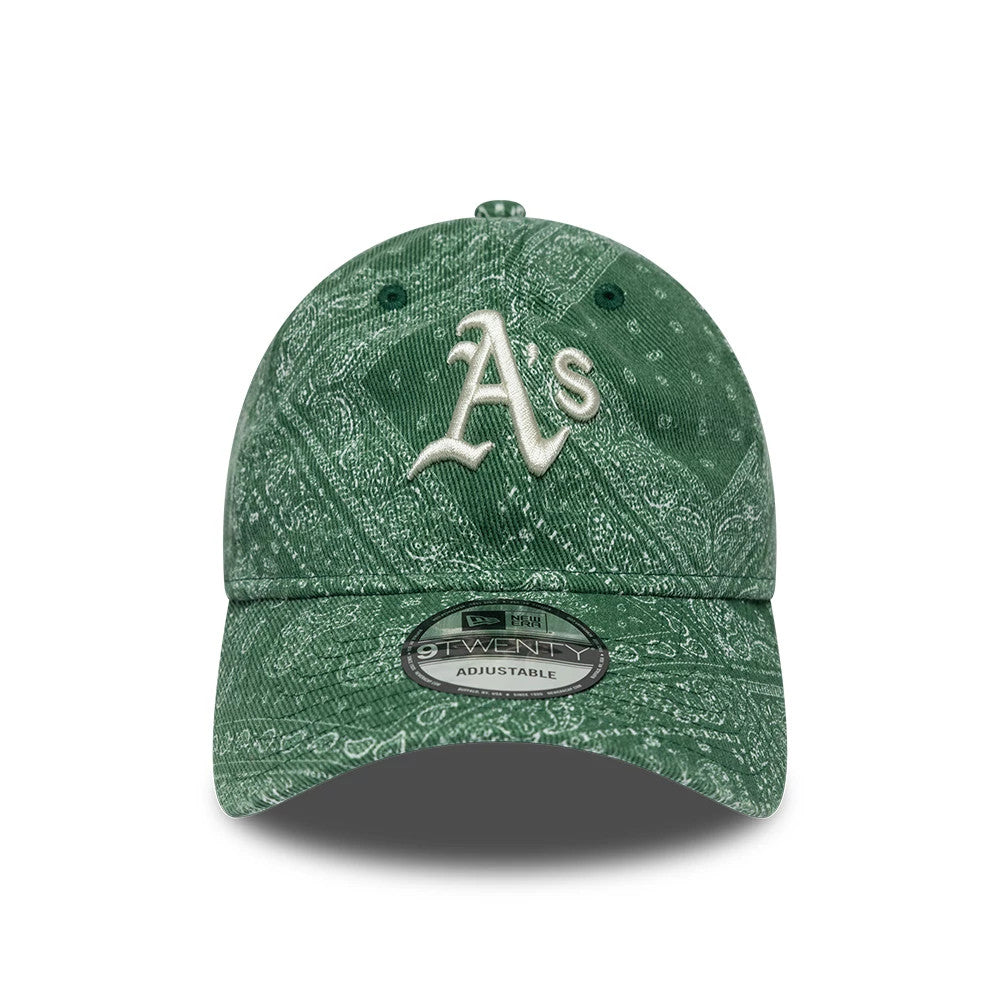 Athletics MLB Washed Paisley Dark Green New Era 9TWENTY Adjustable Cap, front view showing a white embroidered A’s logo on the front panel, detailed with a paisley pattern across the entire crown and a 9TWENTY size sticker on the curved visor.
