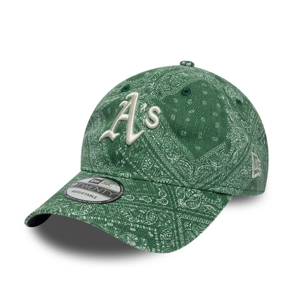 Athletics MLB Washed Paisley Dark Green New Era 9TWENTY Adjustable Cap, three-quarter view showing the front A's logo in raised embroidery, a detailed white paisley pattern across the entire crown.