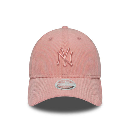 New York Yankees Womens MLB Pastel Cord Pink New Era 9FORTY M-Crown Adjustable Cap, front view showing the pink embroidered NY logo on the structured pastel pink corduroy crown, with a curved visor and a silver 9FORTY size sticker.