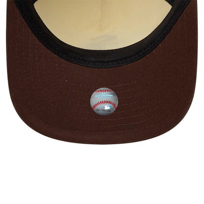 Chicago White Sox MLB Suede Visor Cream New Era 9FIFTY A-Frame Adjustable Cap, inside view showing the brown undervisor, a beige sweatband lining the interior, and a Major League Baseball authenticity sticker at the centre.