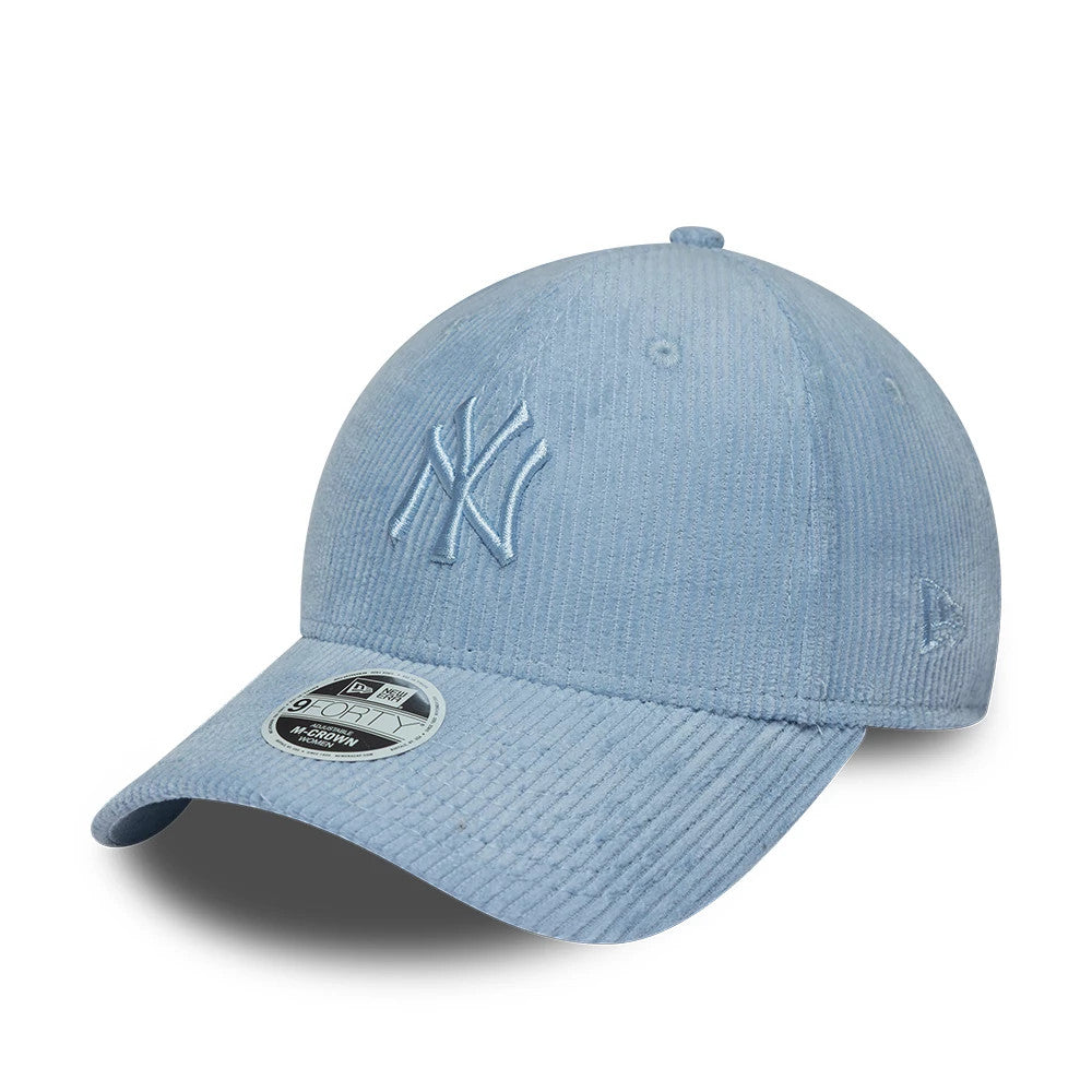New York Yankees Womens MLB Pastel Cord Blue New Era 9FORTY M-Crown Adjustable Cap, three-quarter view showing the raised NY logo on the front panel, with a curved blue cord visor and a 9FORTY size sticker on the top.