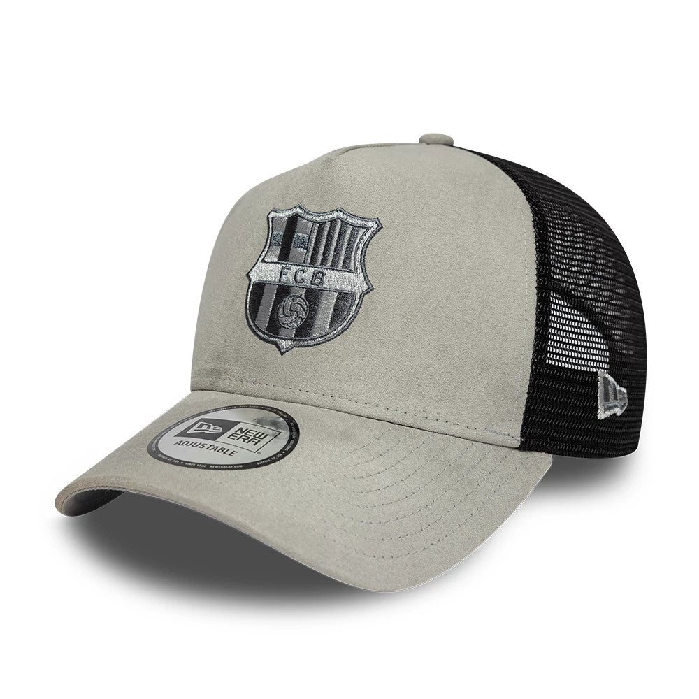 FC Barcelona Faux Suede Grey New Era 9FORTY A-Frame Trucker Adjustable Cap, three-quarter view showing the grey and black embroidered FC Barcelona logo on the front panel, a grey curved visor with a New Era 9FORTY size sticker.