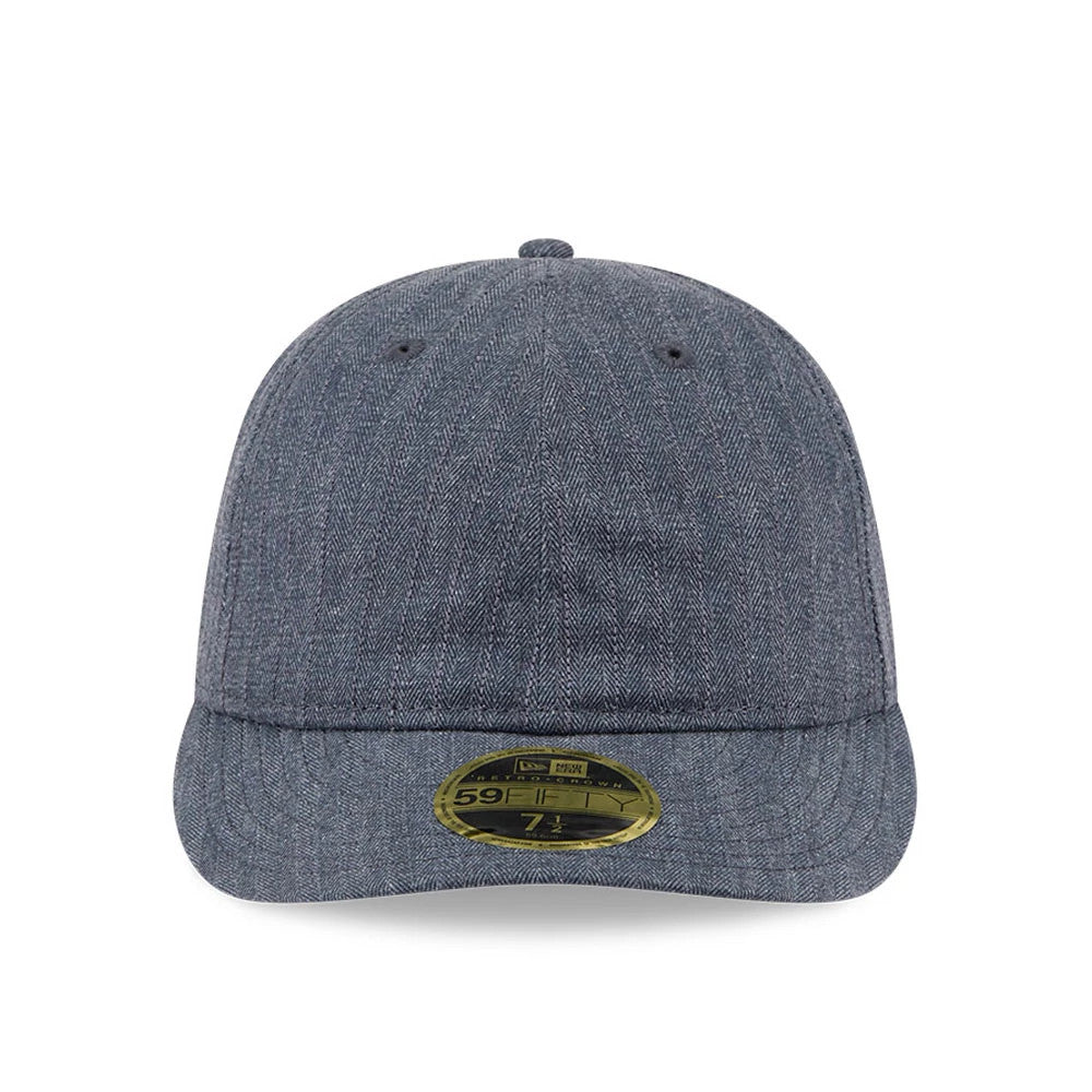 New Era Herringbone Navy Retro Crown 59FIFTY Fitted Cap, front view showing the herringbone pattern across the entire structured crown, with a matching navy curved visor and centrally placed gold 59FIFTY size sticker.