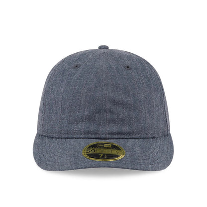 New Era Herringbone Navy Retro Crown 59FIFTY Fitted Cap, front view showing the herringbone pattern across the entire structured crown, with a matching navy curved visor and centrally placed gold 59FIFTY size sticker.