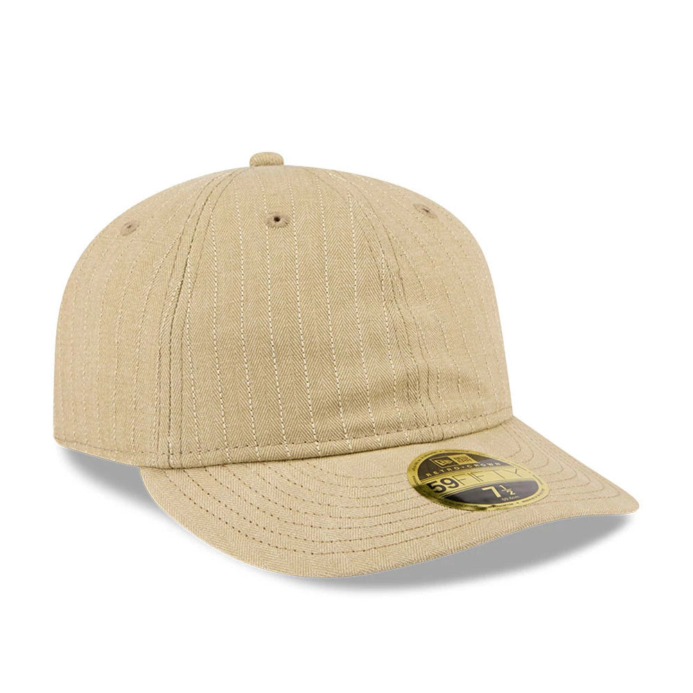 New Era Herringbone Beige Retro Crown 59FIFTY Fitted Cap, three-quarter view showing a herringbone pattern on the beige fabric, with a flat visor and a gold 59FIFTY size sticker on the visor, accentuating the classic design.