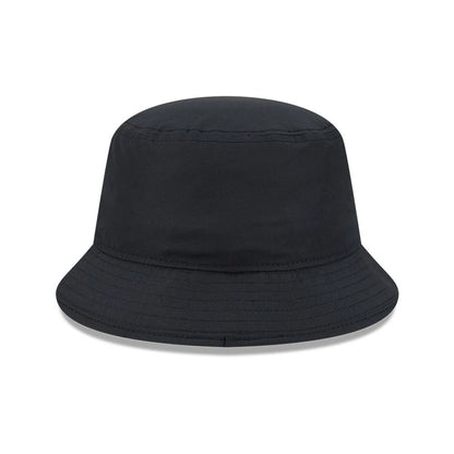 New Era Netflix Stranger Things Black Bucket Hat, front view showing a and simple design with a structured crown, a downward-sloping stitched visor, and a black fabric finish reflecting the minimalistic style of the series.