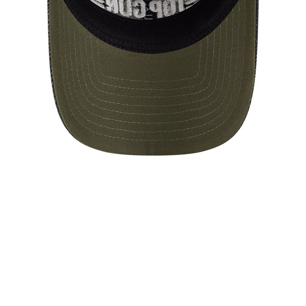 Top Gun Black New Era 9TWENTY Adjustable Cap, inside view showing the green undervisor with black stitching, partially Top Gun graphic on the inner lining beneath the crown, and the slightly curved shape of the visor edge.