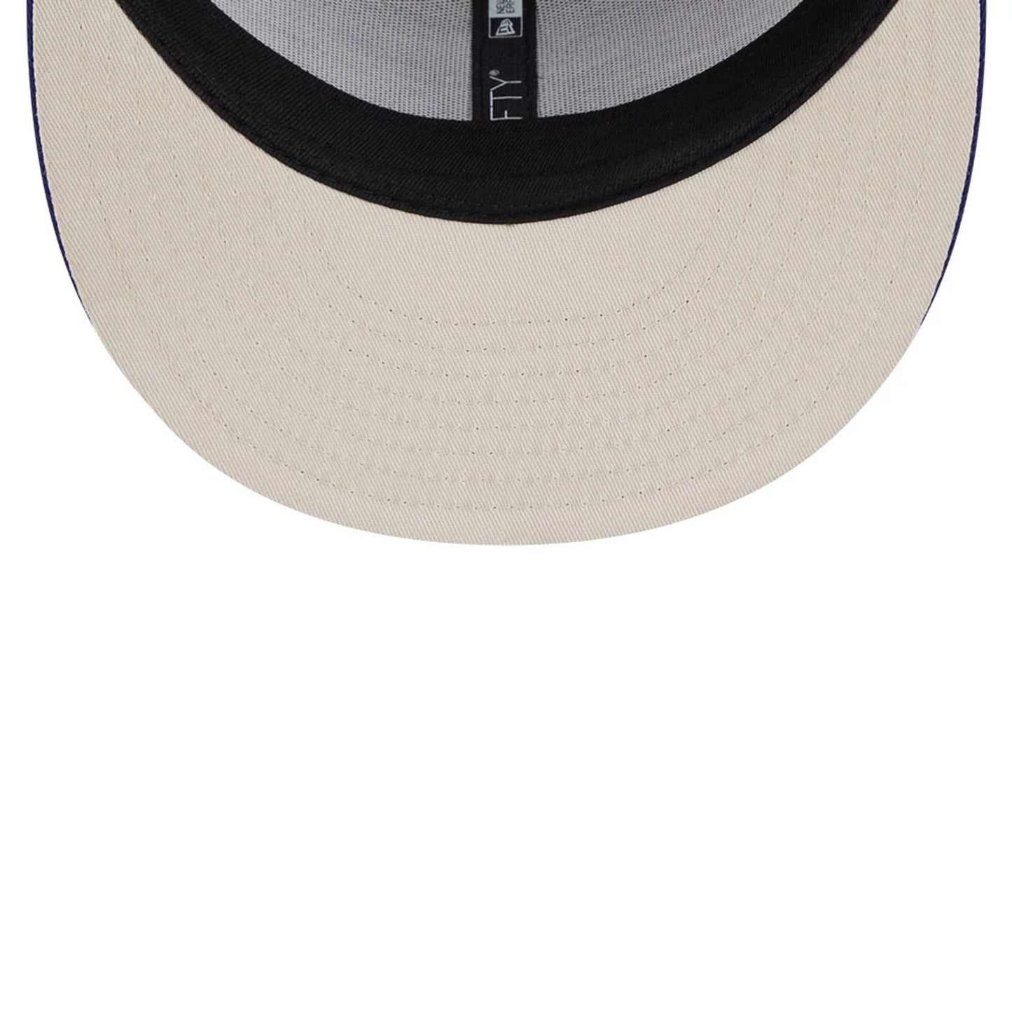 Pictured is this Top Gun 9FIFTY Trucker cap in dark blue. 2