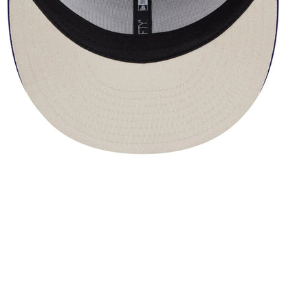 Pictured is this Top Gun 9FIFTY Trucker cap in dark blue. 2