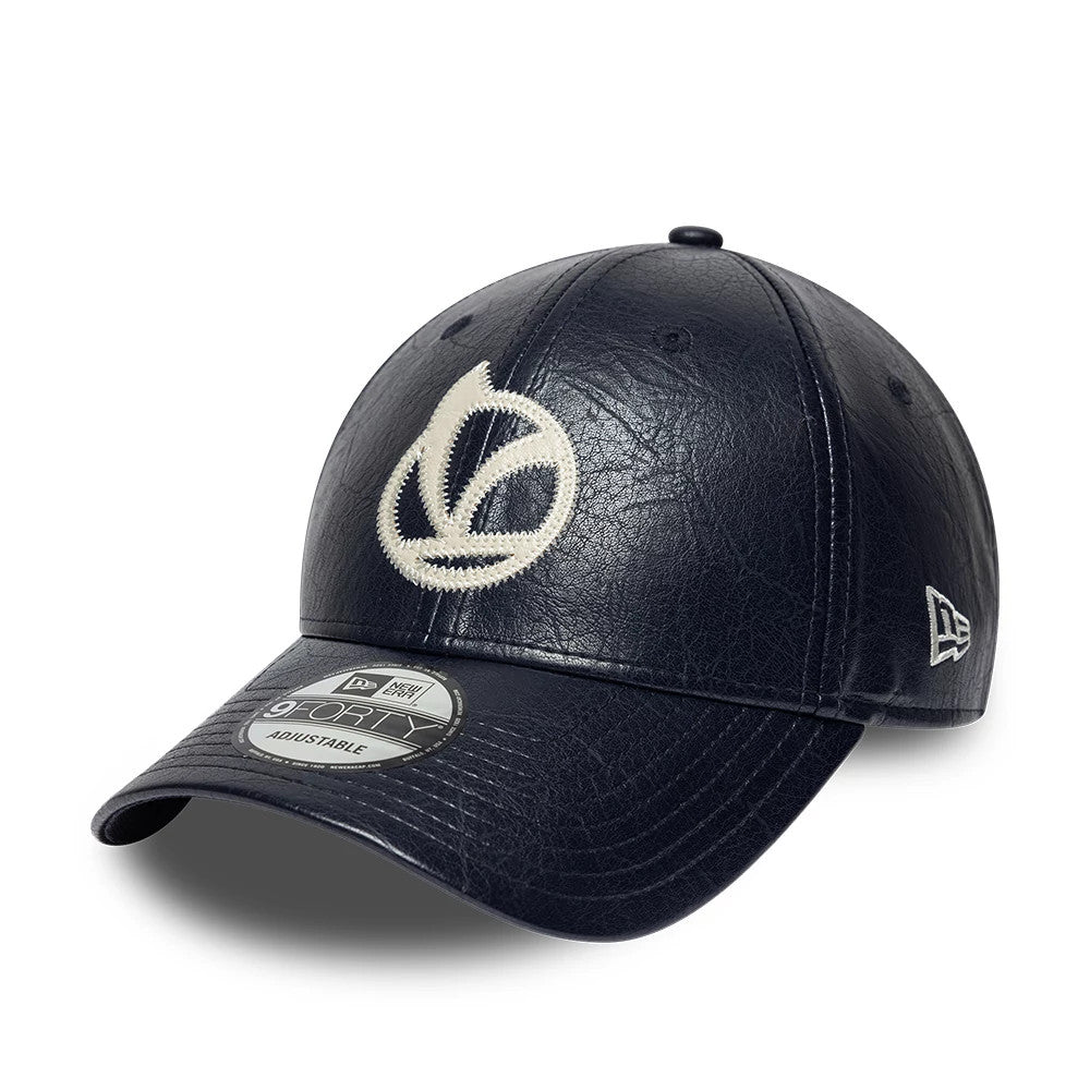 Pictured is this Crinkle PU Vespa 9FORTY Adjustable cap in navy. 1
