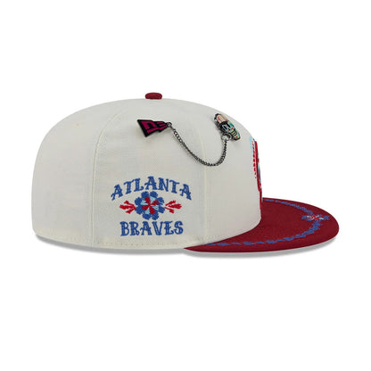 Pictured is this MLB Day Of The Dead Atlanta Braves 59FIFTY Fitted cap in light beige & dark red. 5