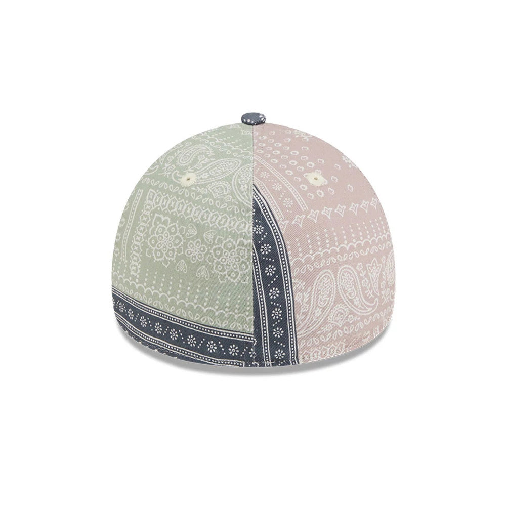 New Era Patchwork Bandana Multi 59FORTY A-Frame Fitted Cap, top view showing the intricate multicoloured bandana print design with contrasting green and pink panels, a dark blue visor, four eyelets, and a fabric top button.