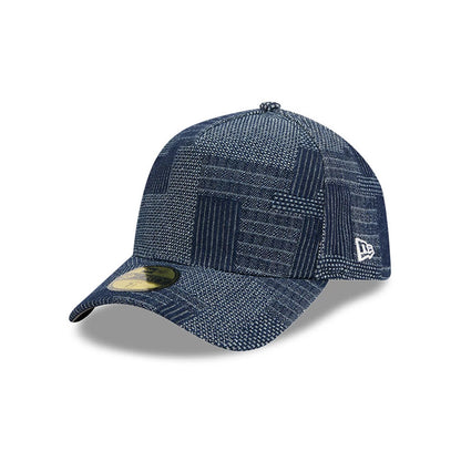 Pictured is this New Era Patchwork Denim 59FORTY A-Frame Fitted cap in navy. 1