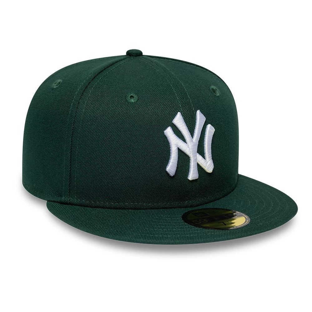 New York Yankees MLB League Essential Dark Green New Era 59FIFTY Fitted Cap, front view showing the raised white embroidered NY logo on the structured dark green crown, with a flat dark green visor and gold 59FIFTY size sticker.