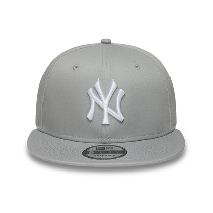 Pictured is this MLB League Essential New York Yankees 9FIFTY Snapback Adjustable cap in light grey. 2