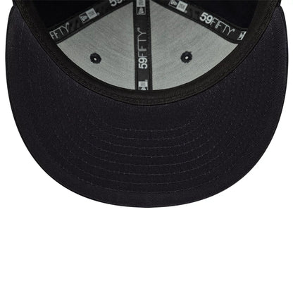 Pictured is this New Era Oval Patch 59FIFTY Fitted cap in navy. 5