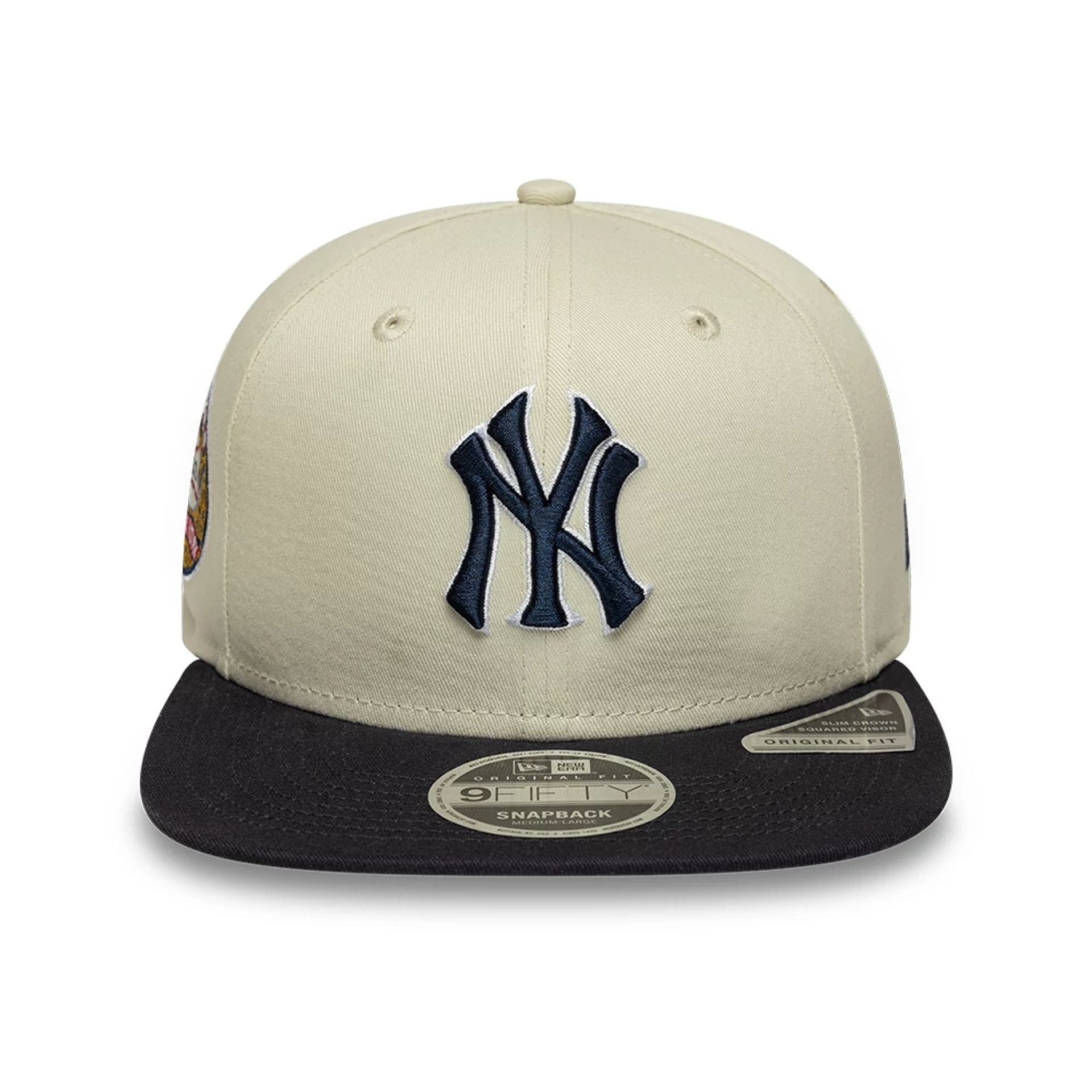 Pictured is this MLB World Series Patch New York Yankees 9FIFTY Snapback Adjustable cap in light beige. 2