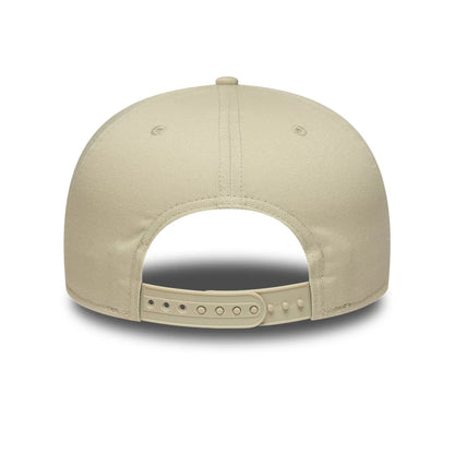 Pictured is this MLB League Essential New York Yankees 9FIFTY Snapback Adjustable cap in light beige. 4