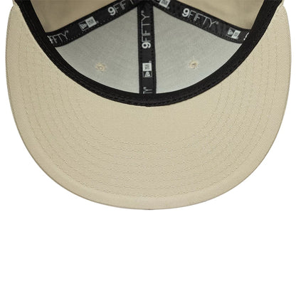 Pictured is this MLB League Essential New York Yankees 9FIFTY Snapback Adjustable cap in light beige. 5