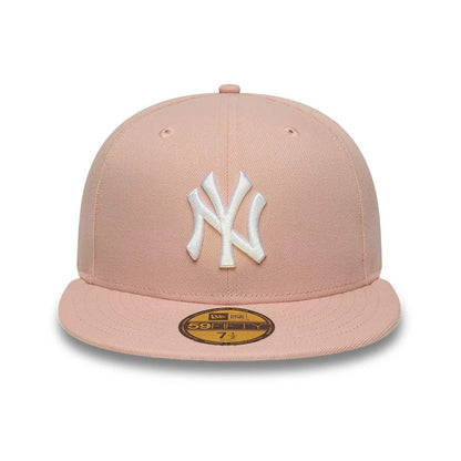 Pictured is this MLB League Essential New York Yankees 59FIFTY Fitted cap in pastel pink. 2